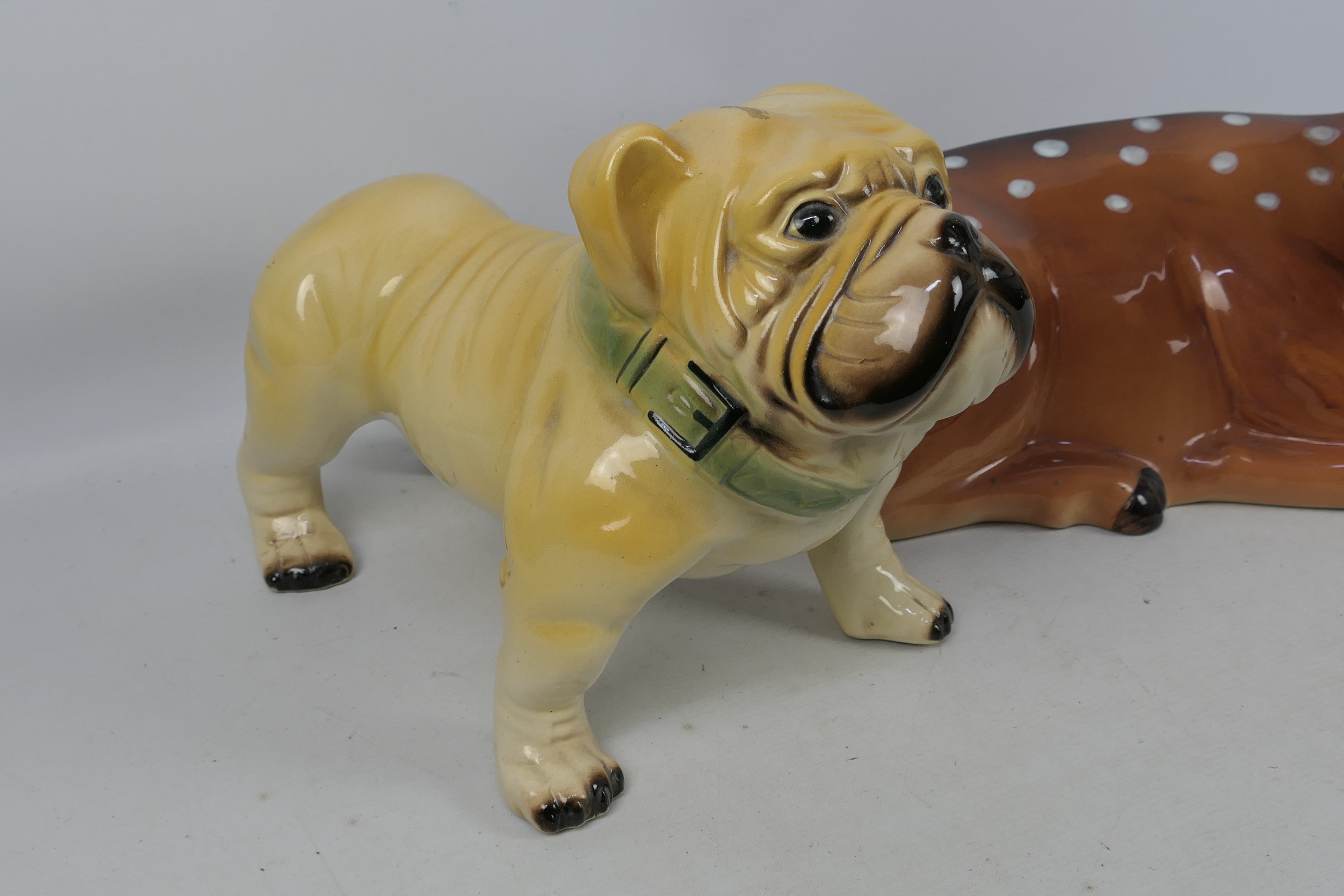 A large ceramic model of a deer, approximately 48 cm (l) and a model of a bulldog. - Image 3 of 5