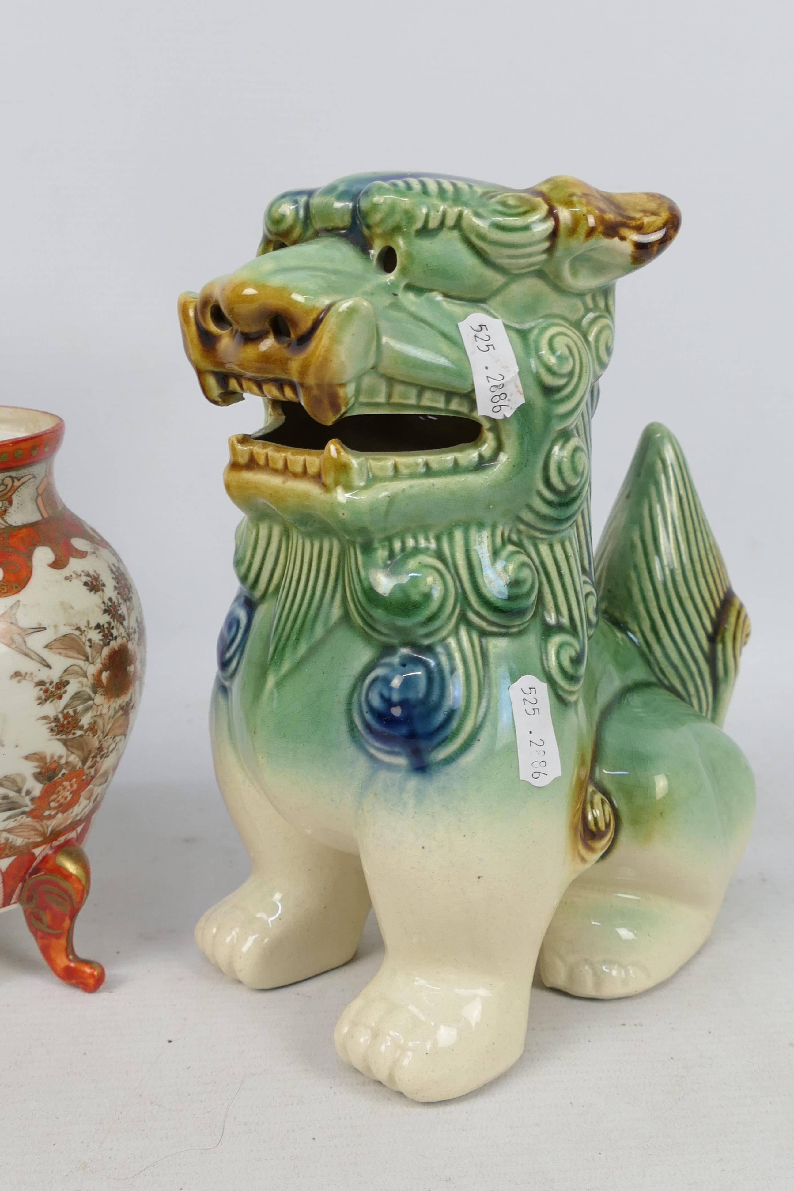 A pair of ceramic Buddhist lions, - Image 3 of 7