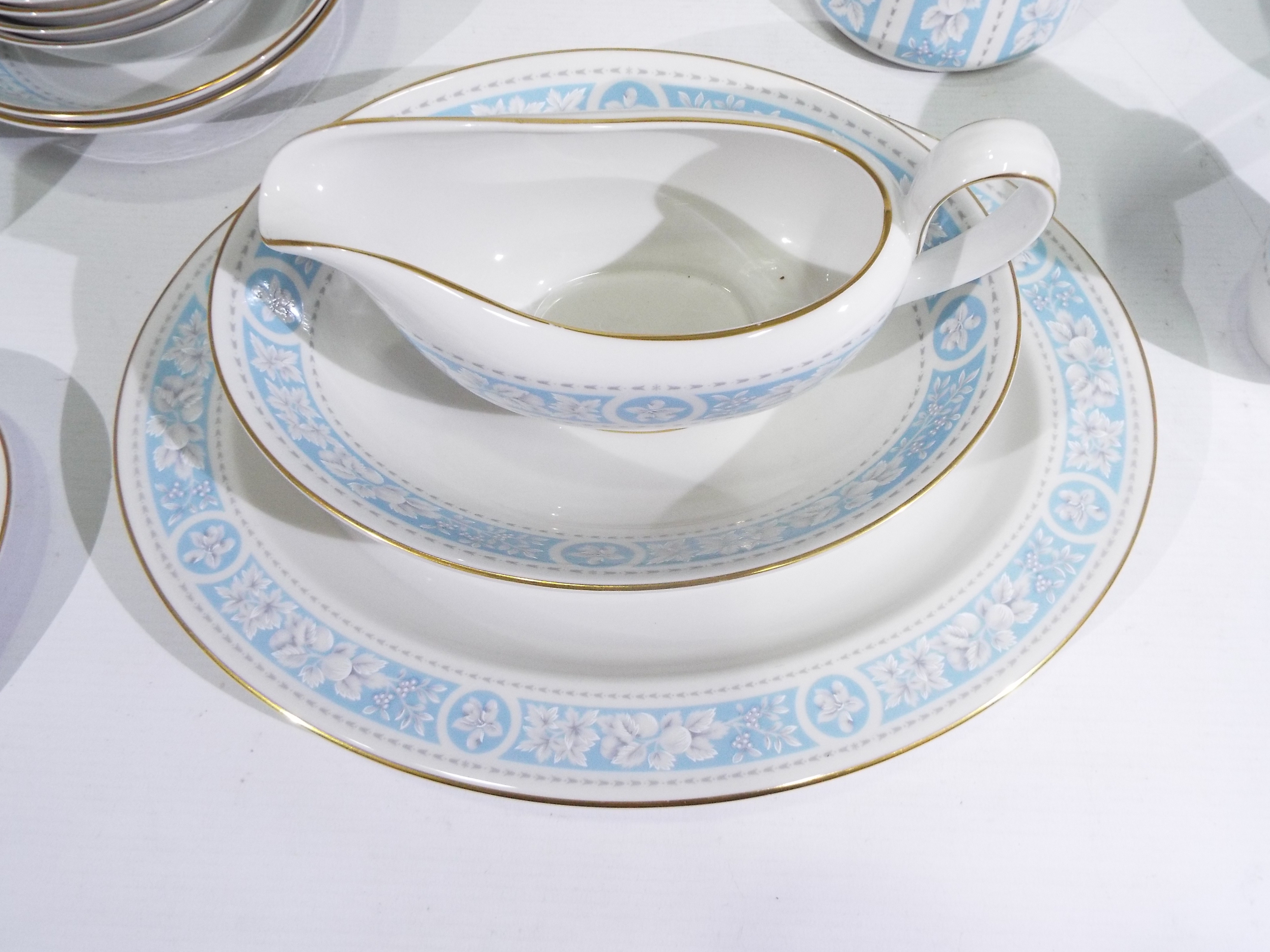 A quantity of Royal Doulton dinner and tea wares in the Hampton Court pattern, - Image 8 of 9