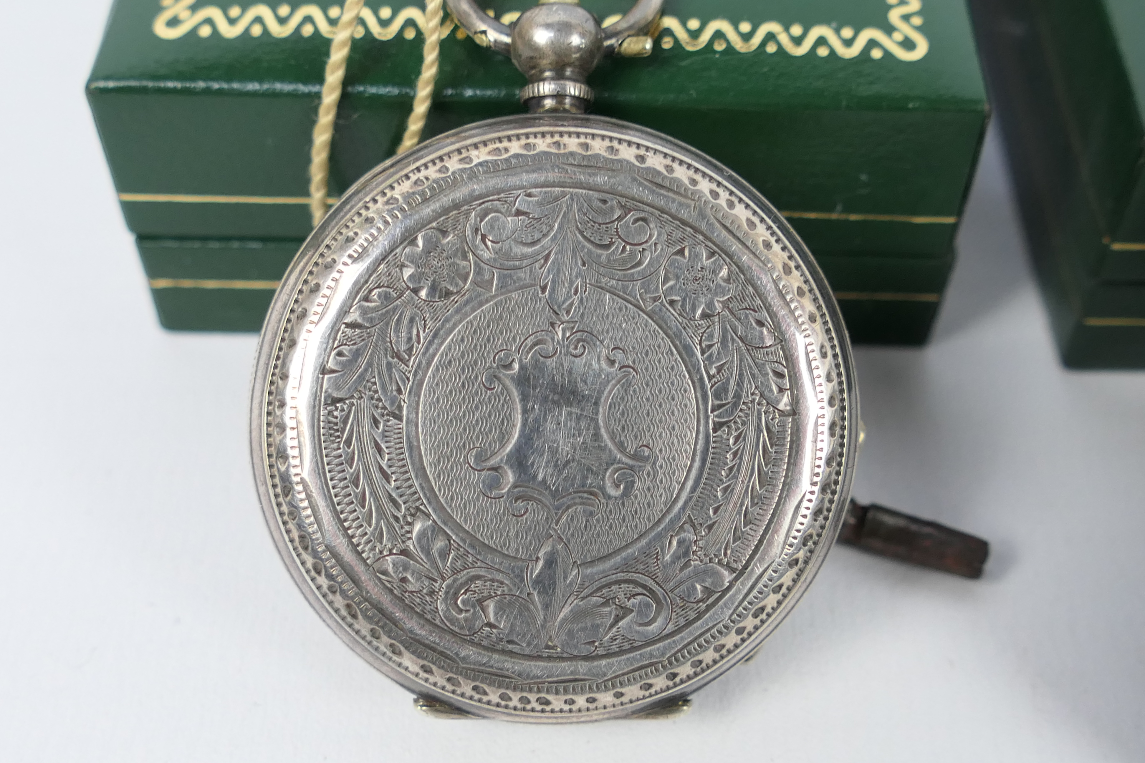 A silver cased, open face lady's pocket watch with Roman numerals to a white, - Image 3 of 6