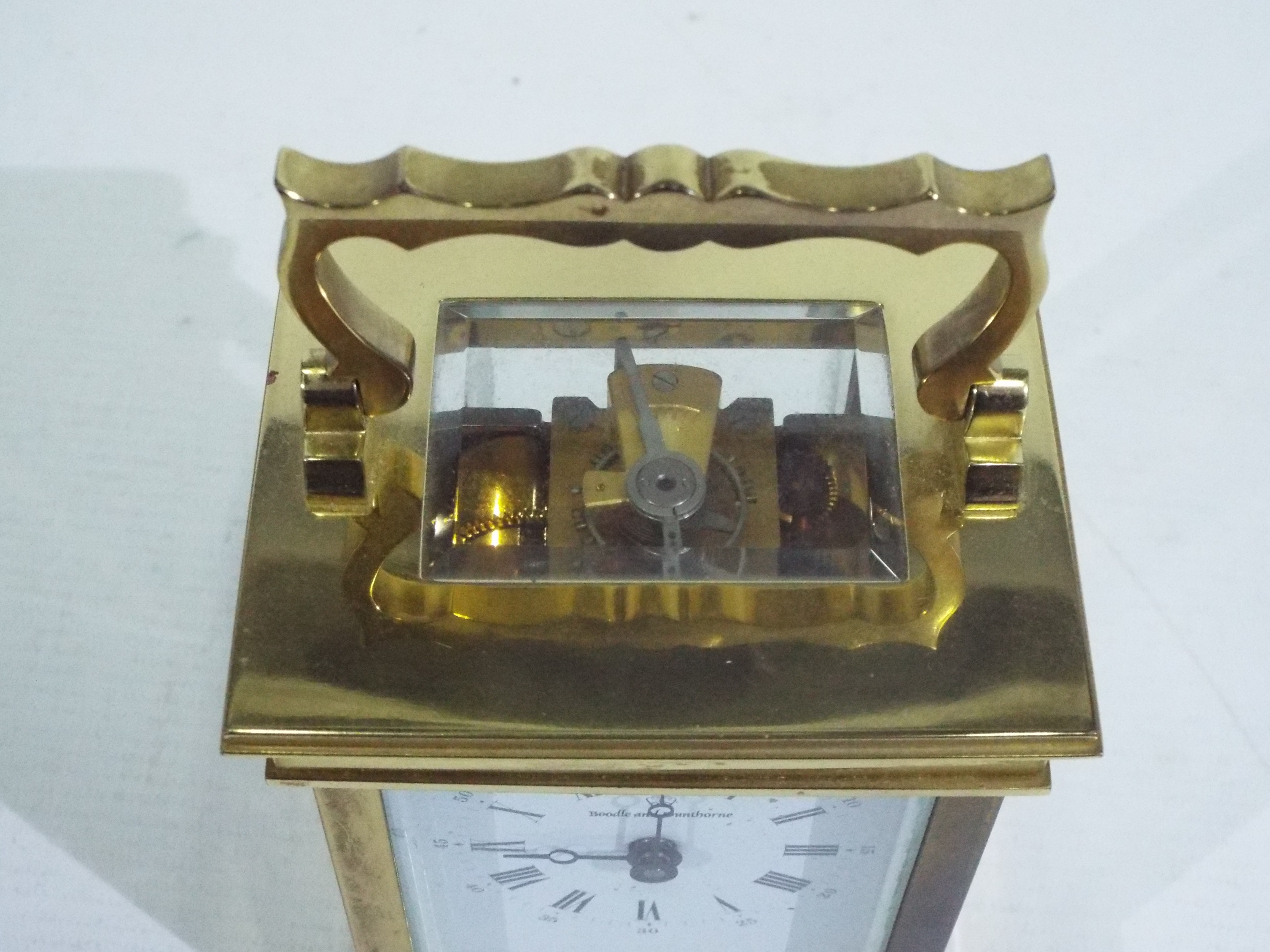 Boodle & Dunthorne - A French gilt brass and glass carriage alarm timepiece retailed by Boodle & - Image 5 of 6