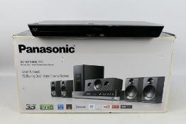 A boxed Panasonic Blu-ray Home Theatre Sound System, model SC - BTT405, unchecked for completeness.