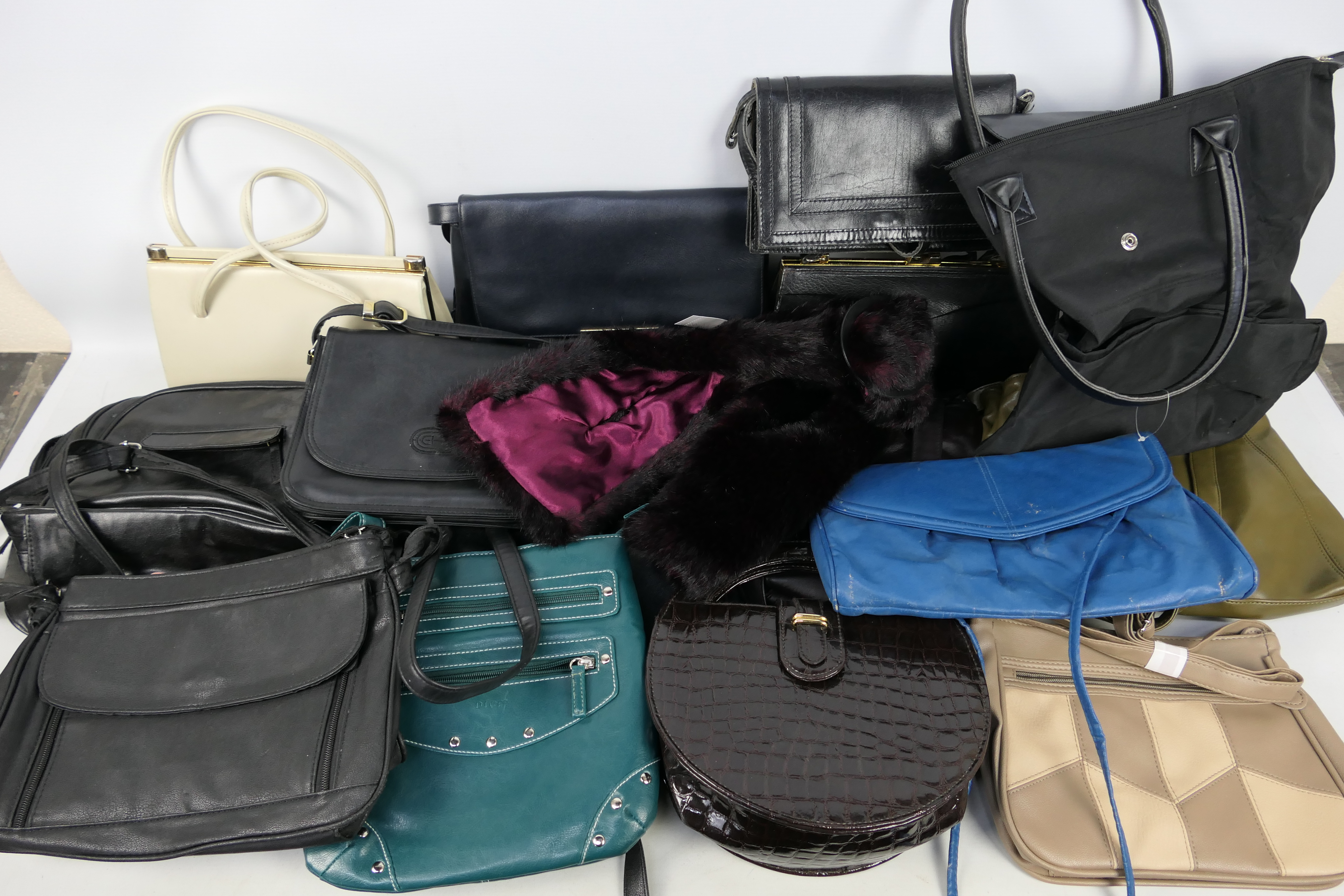 A collection of lady's handbags.