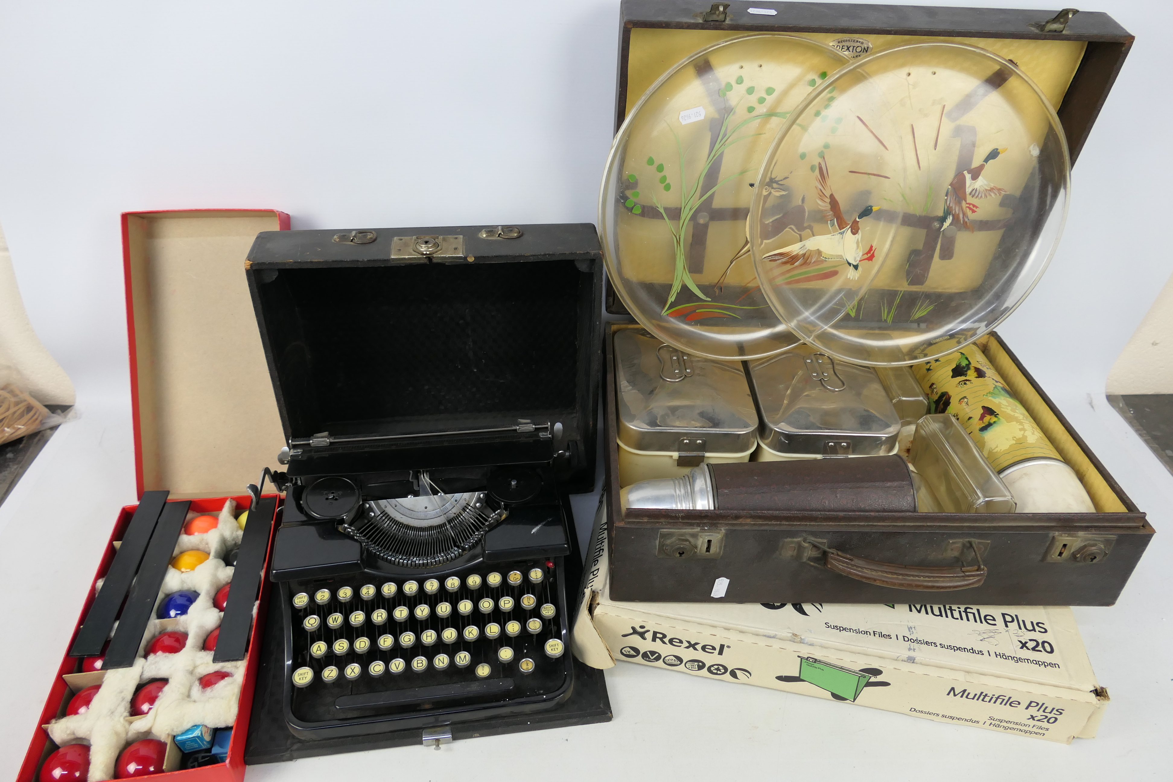 Lot to include a vintage Bluebird portable typewriter in case, vintage picnic set,