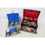Two jewellery boxes containing a quantity of costume jewellery, rings, earrings, bracelets,