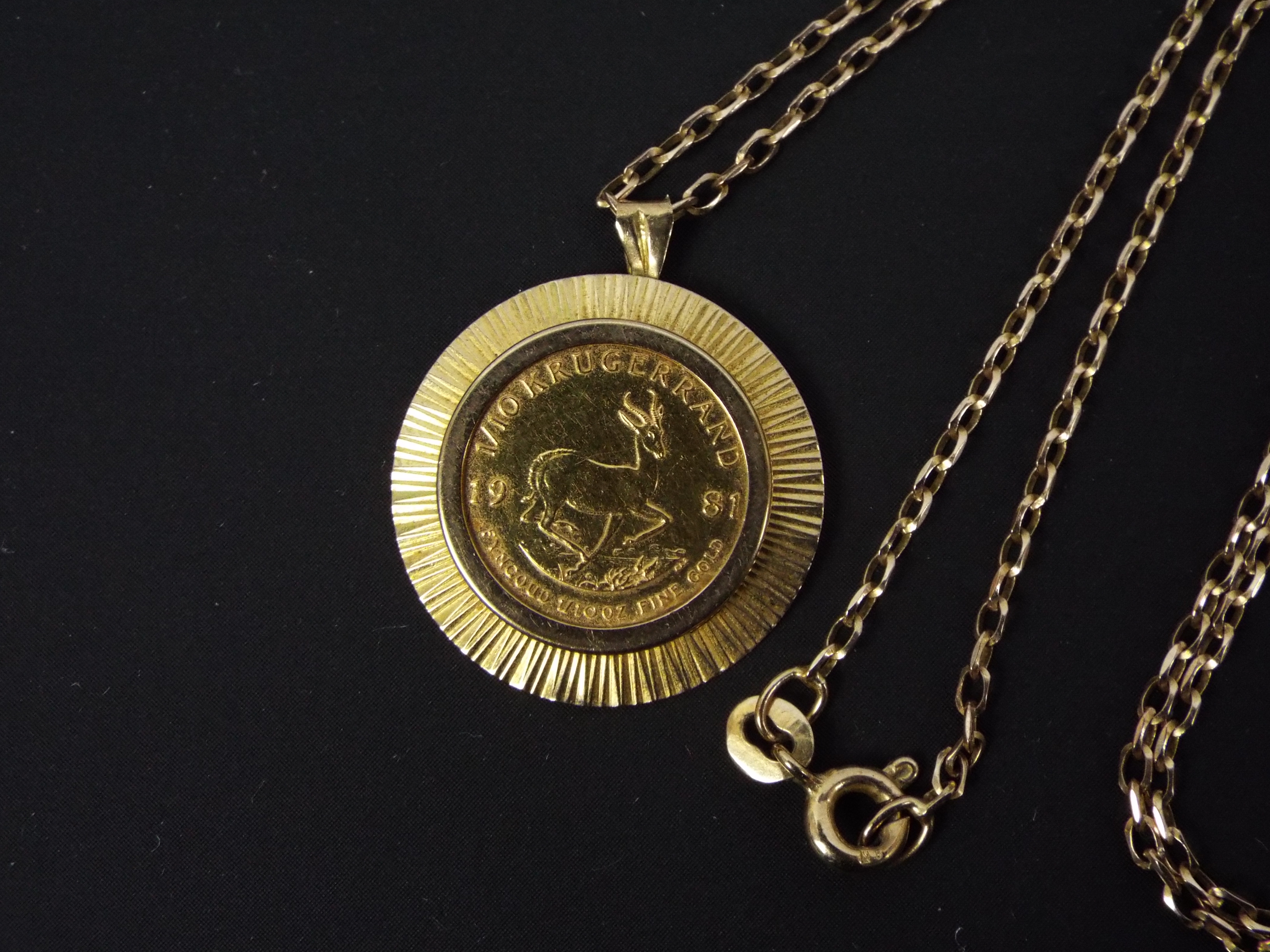 A 1981 1/10 ounce Krugerrand coin in 9ct yellow gold pendant mount suspended from a 9ct yellow gold - Image 2 of 3