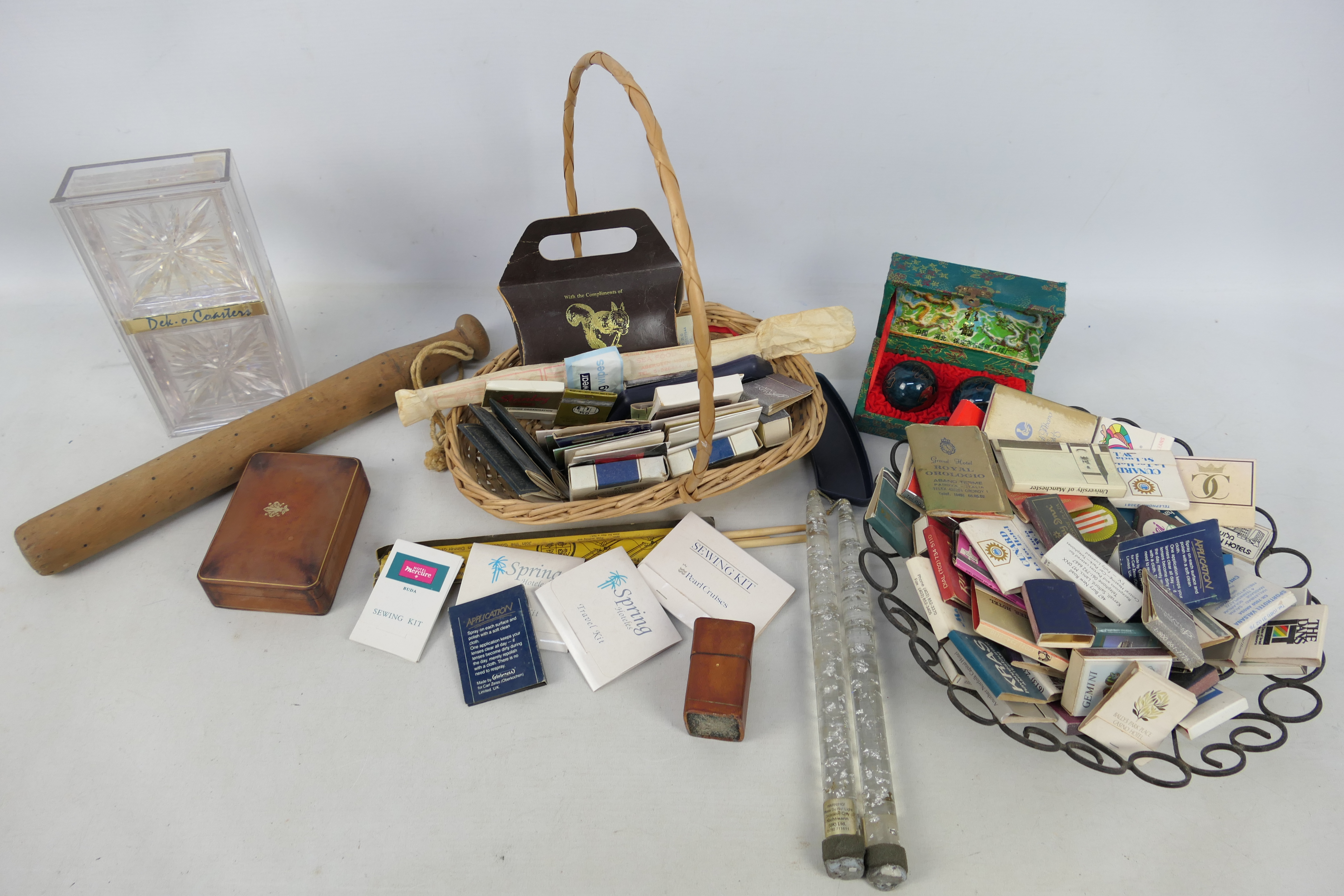 A collection of vintage match boxes / match books and a small wooden truncheon, 34 cm (l).