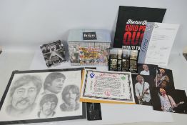 A Status Quo tour programme, fan club letter, promotional images, Beatles related items.