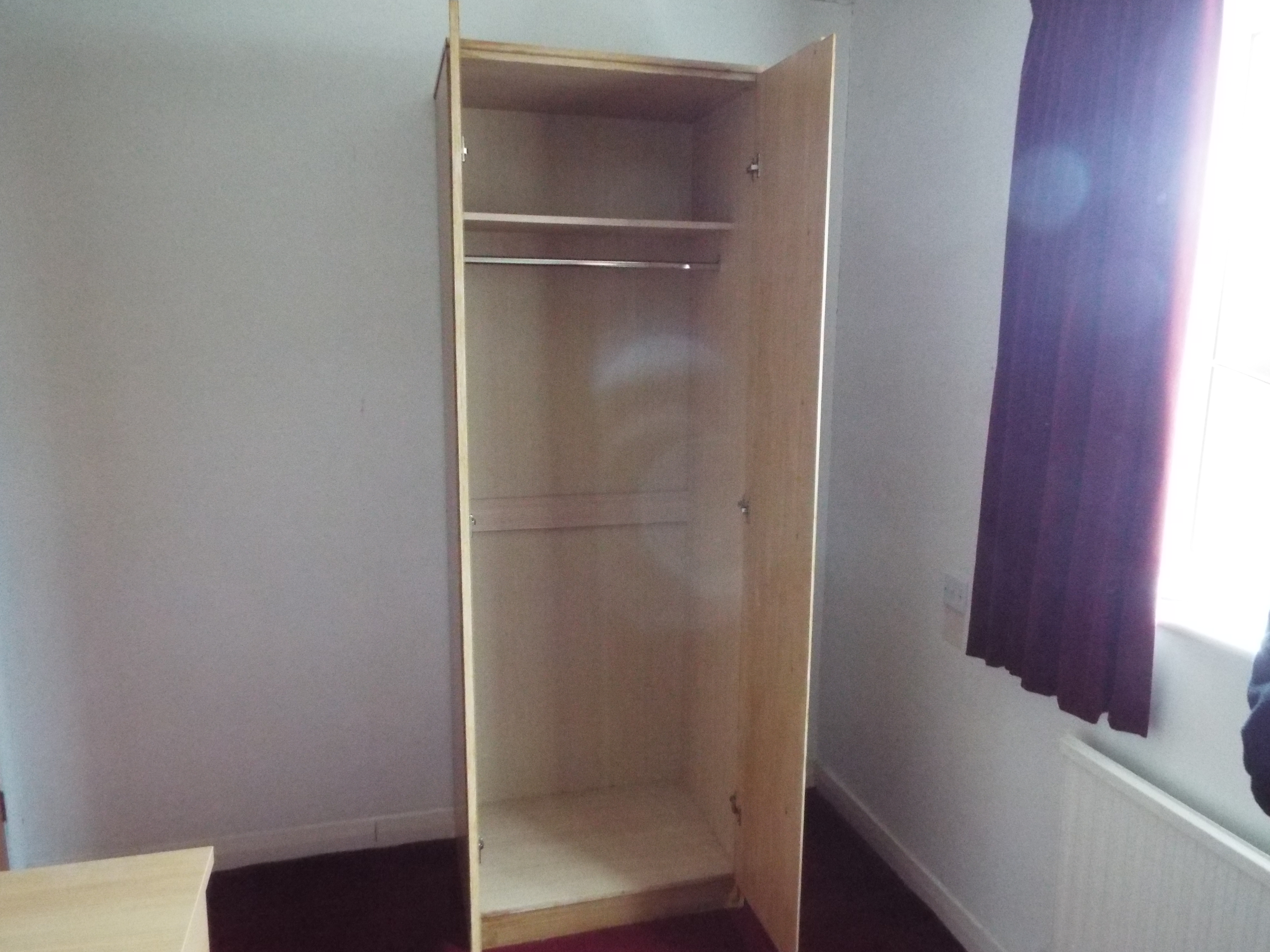 A light wood twin door wardrobe measuring approximately 198 cm x 69 cm x 51 cm. - Image 2 of 3