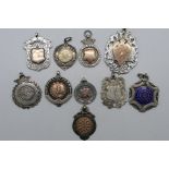 A collection of ten silver sporting meda