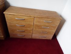 A chest of eight drawers measuring approximately 74 cm 162 cm x 40 cm.