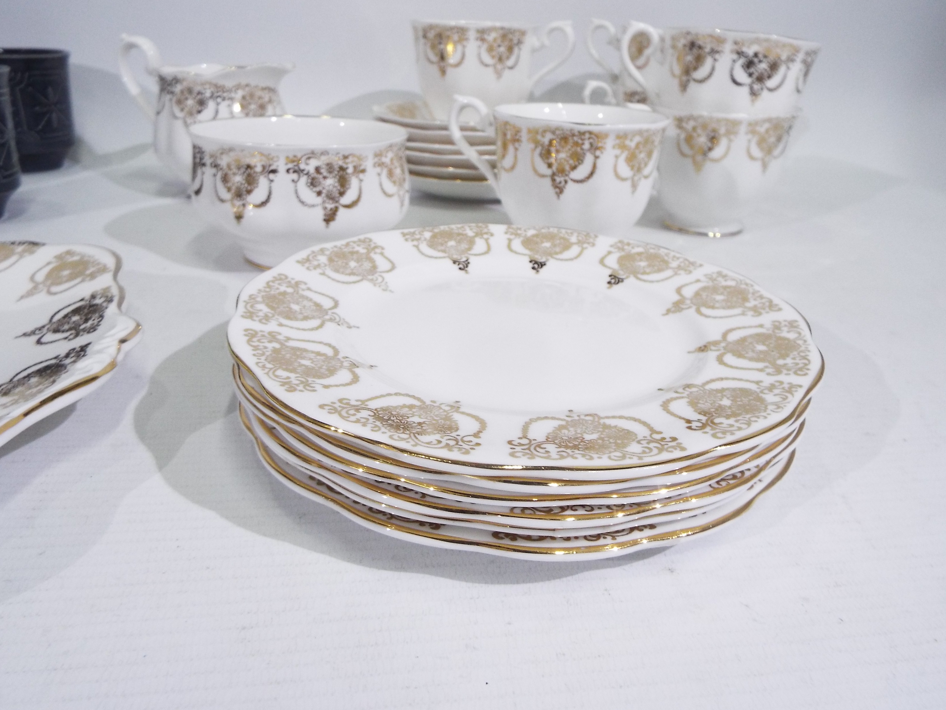 Royal Albert - A collection of tea wares with decoration of gilt floral swags comprising six trios, - Image 5 of 7