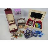 Jewellery boxes and a quantity of costume jewellery.