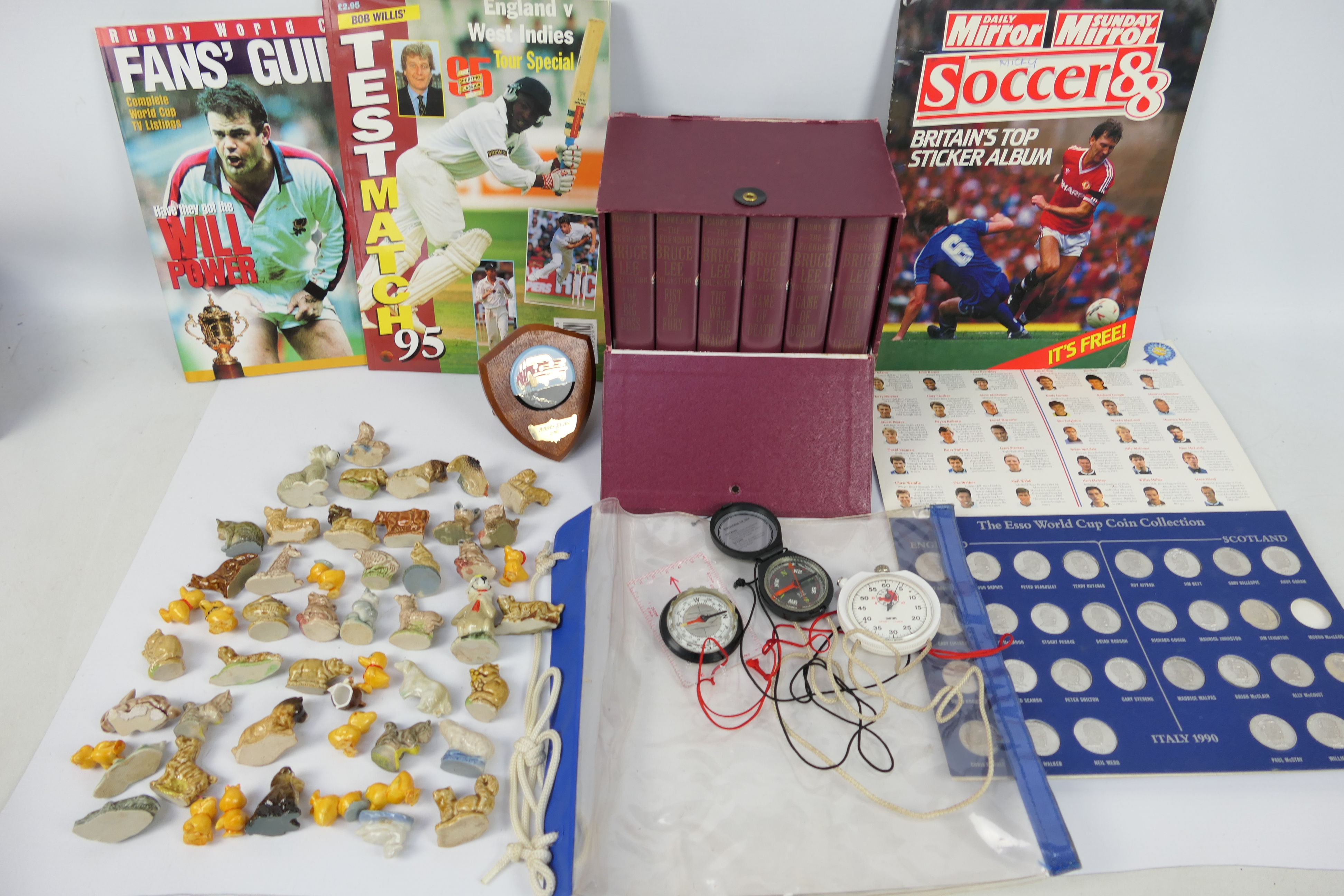 A mixed lot of collectables to include ceramics, sporting related items,