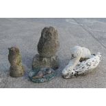 Four reconstituted stone garden ornaments, largest approximately 43 cm (h).