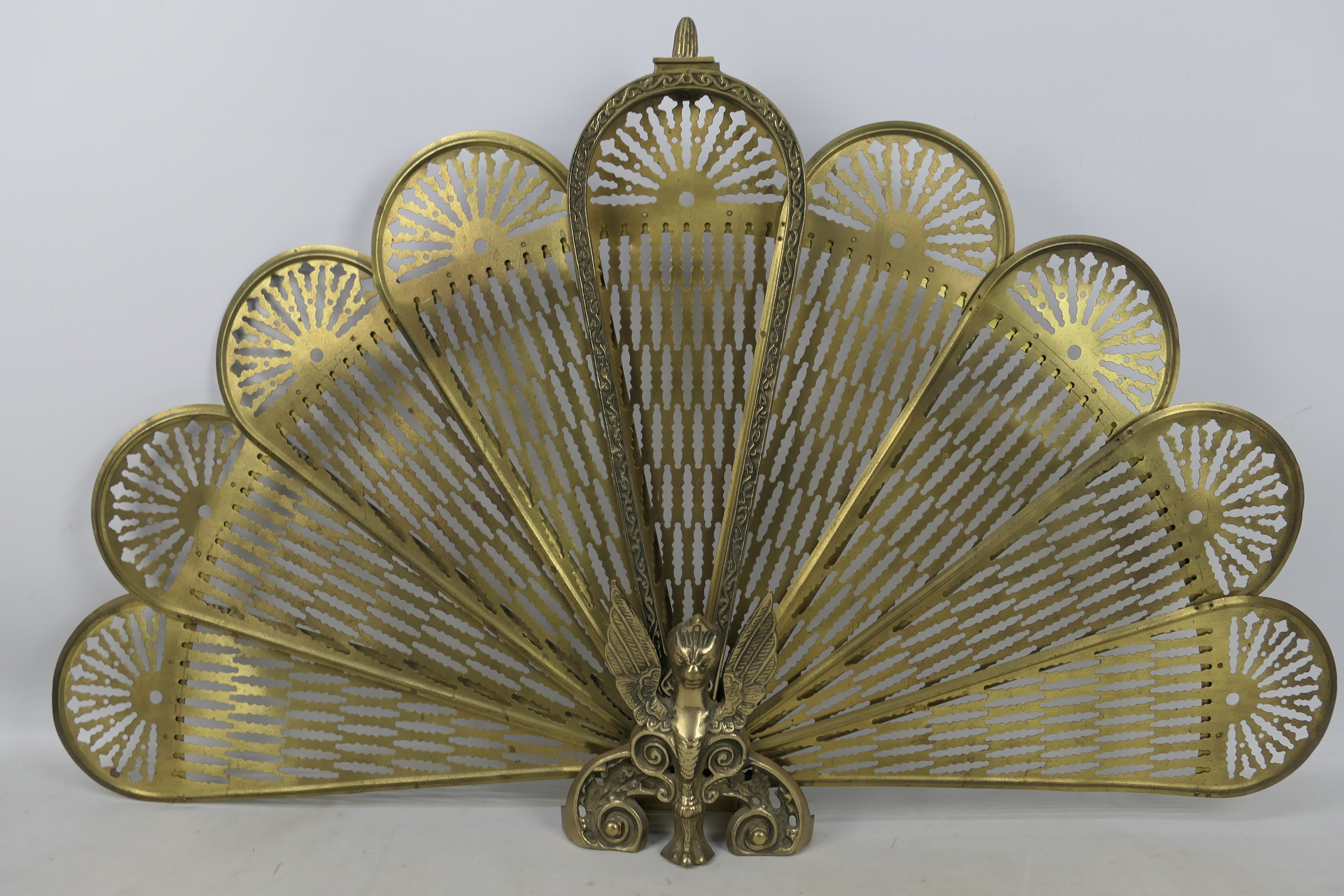 Three fire guards including a brass Peacock example and a brass fireside companion set. - Image 4 of 5