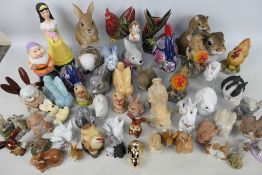 A quantity of decorative figures and ornaments, predominantly animals.