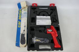 A Clarke LCD Inspection Camera, model CIC2410, contained in hard case and a vintage car aerial.