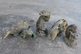 Five reconstituted stone garden ornaments, largest approximately 40 cm (h).