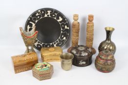 Lot to include a Satsuma covered box, a pair of carved wood candlesticks with napkin rings,
