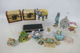 A quantity of dressing table and ornamental items to include scent bottles, trinket boxes and other.