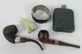 Two vintage K&P Peterson smokers pipes one with silver mount, hip flask and other.