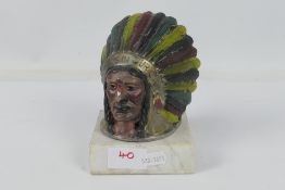 A cast metal Guy Motors Ltd mascot / advertising piece depicting a native American in headdress