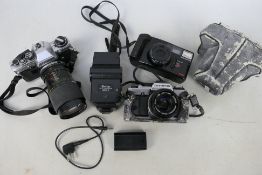 Photography - Olympus cameras comprising