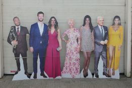 A collection of cardboard cut outs to in