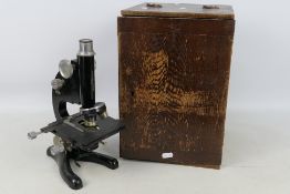 A boxed Beck Of London microscope, model