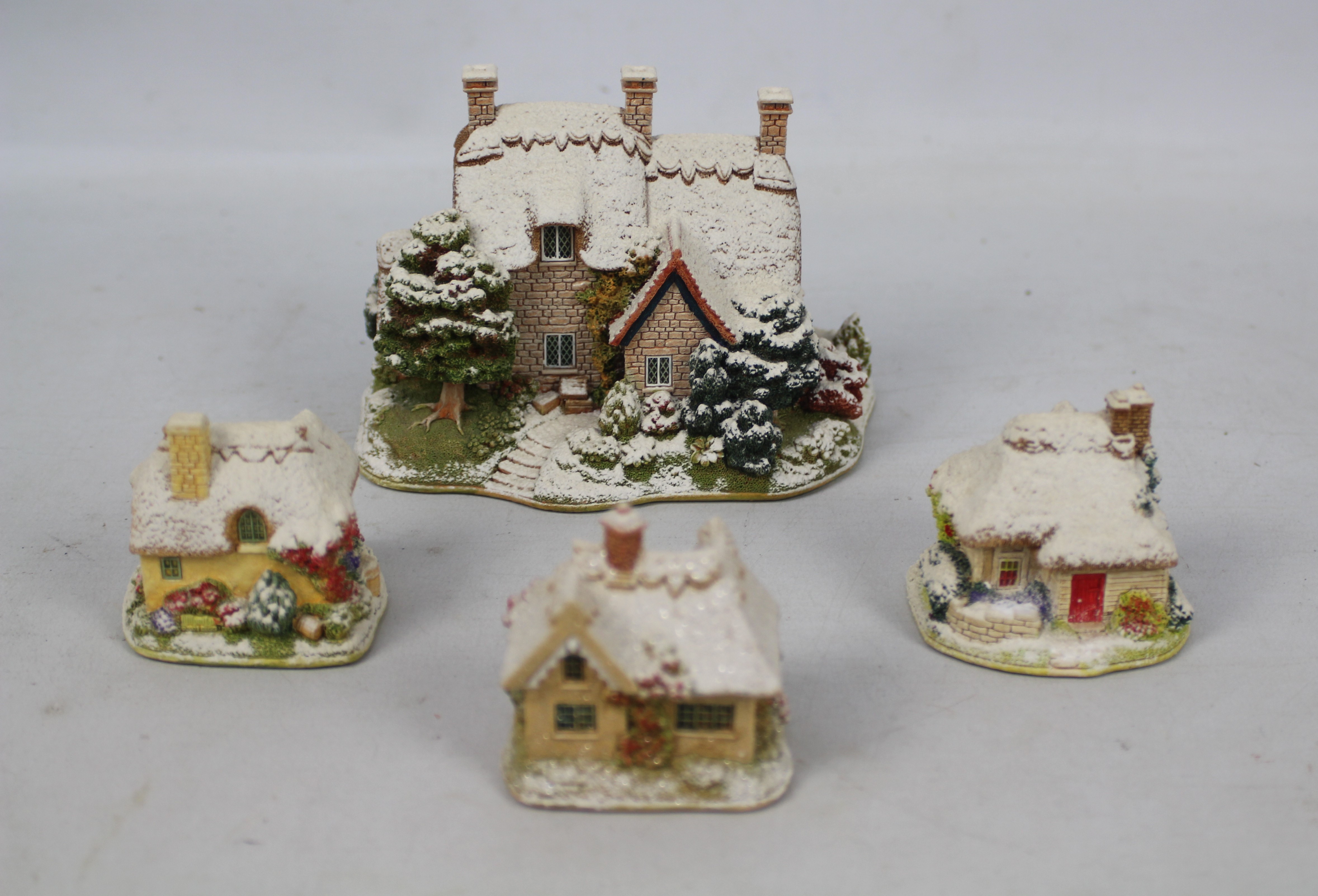Lilliput Lane - Four boxed Christmas themed model cottages comprising three from the Snow Place - Image 4 of 4