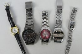 A small collection of wrist watches.
