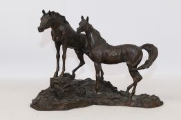 A cold cast bronze equine group after Lanford Monroe, entitled Intruder, issued by Franklin Mint,