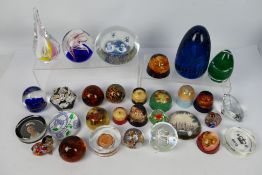 A collection of various paperweights.