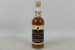A 75cl bottle of Mortlach Over 12 Years Old, 40% vol, level upper shoulder,