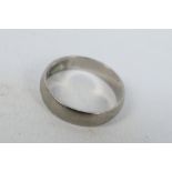 A wedding band stamped PD 500 for palladium, size T+½, approximately 3.