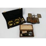 Three set of vintage scales comprising a set of postal scales (with weights),