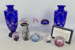 A collection of paperweights to include Caithness, Whitefriars, Murano, Strathern and similar,