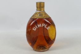 Haig Dimple, 26⅔ fl oz, 70° proof, wire wrapped bottle, likely a 1960's or 1970's bottling.