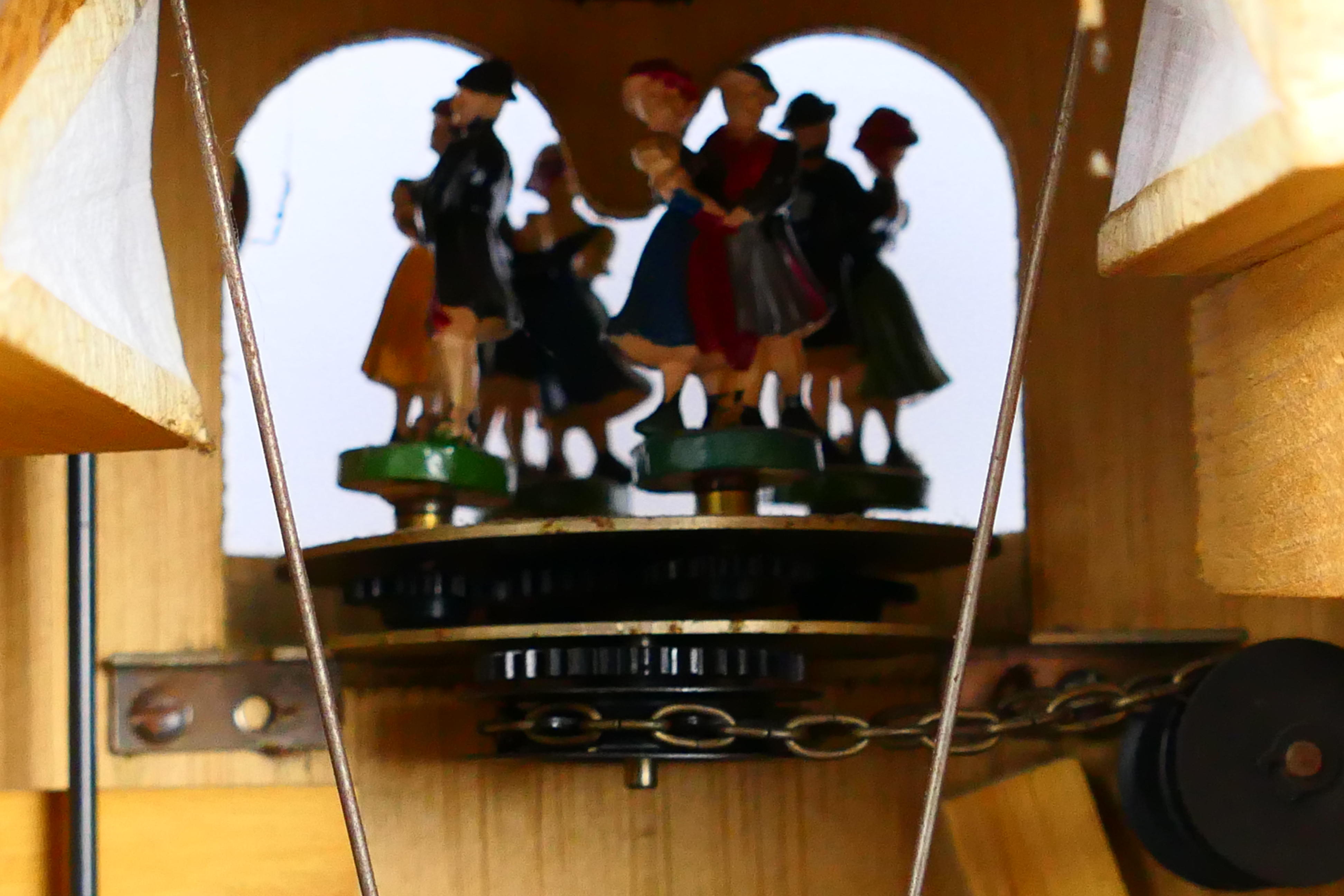 A black forest style cuckoo clock with game carved decoration, with pendulum and weights. - Image 8 of 8