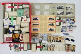 A good collection of cigarette / tea cards, predominantly organised in sets / part sets.