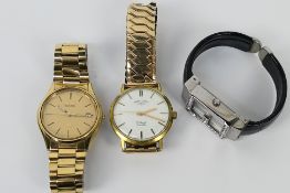 Three wrist watches to include a Seiko SQ, Rotary and similar.