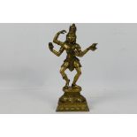 A 20th century brass model depicting Shiva, 28 cm (h).