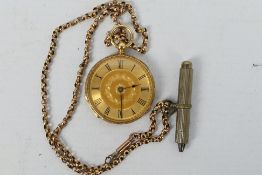 A late 19th century yellow metal lady’s pocket watch,