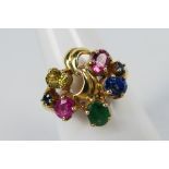 An 18ct multi-stone set fancy dress ring, size Q, approximately 4.