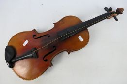 Violin, paper label to the interior Vuillaume a Paris, Rue Croix des Petits Champs 46,