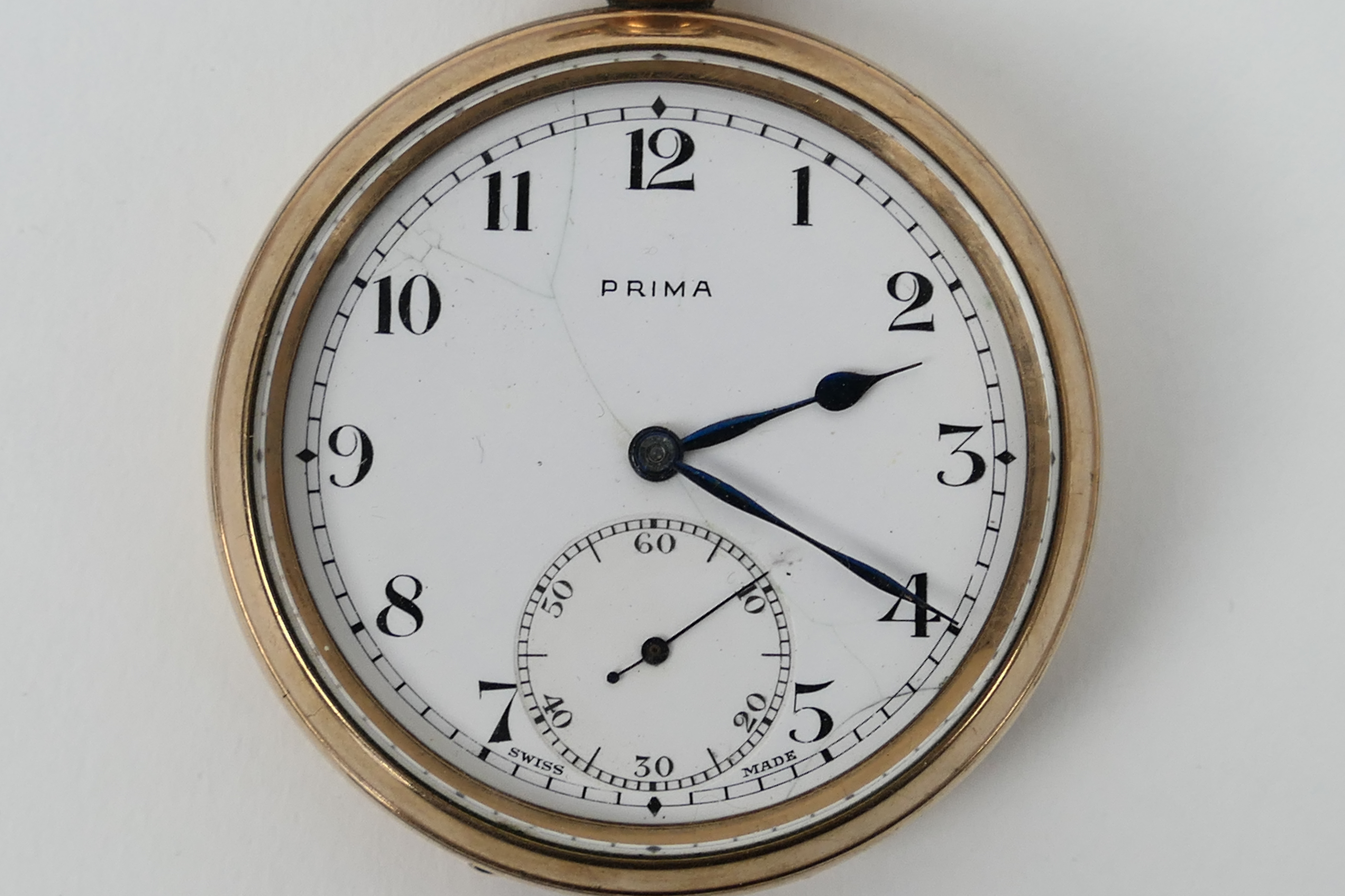 A Prima gold plated, open face pocket watch, the signed white dial with Arabic numerals, - Image 2 of 5