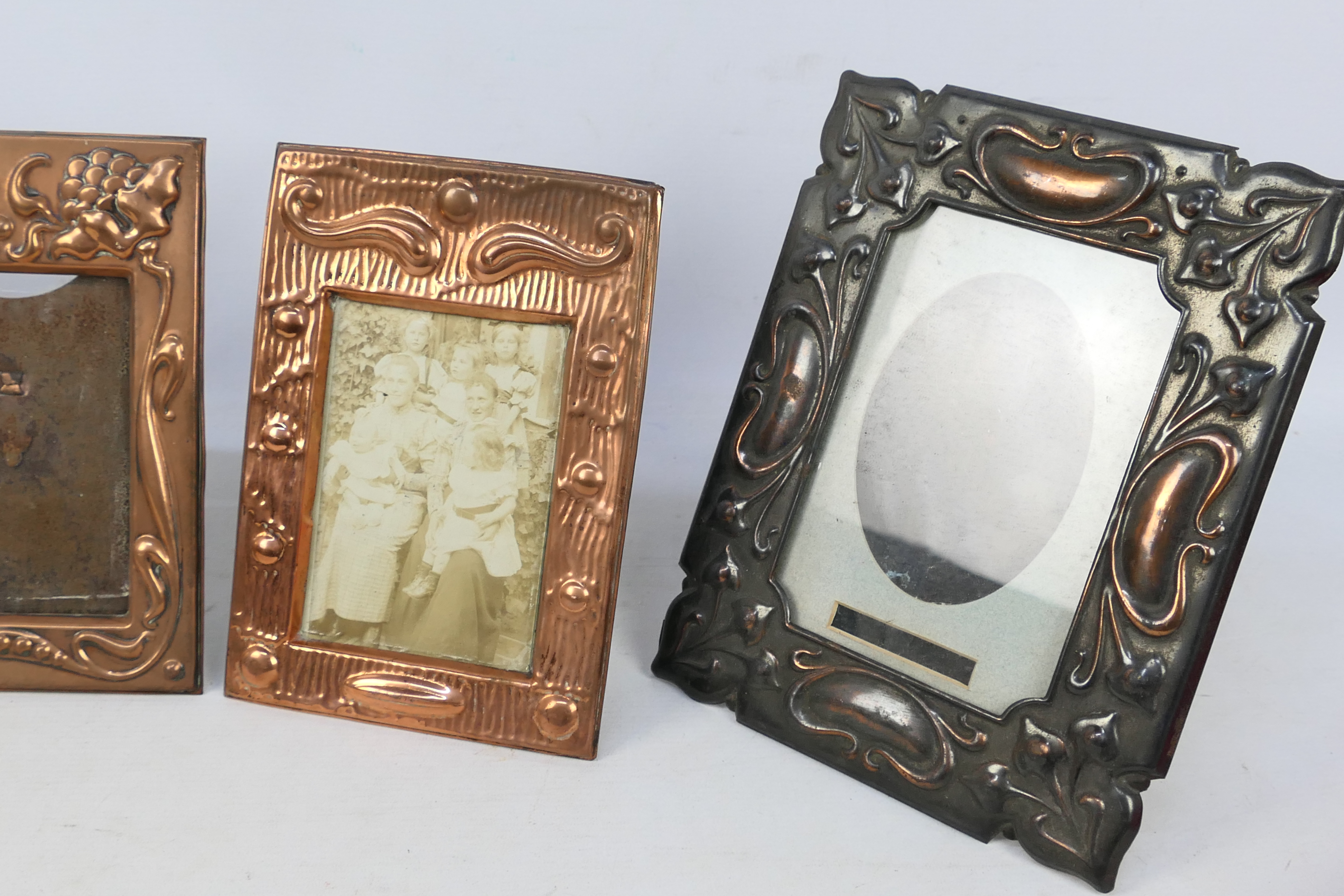 Four copper framed, easel back photograph frames including Art Nouveau style. - Image 3 of 4