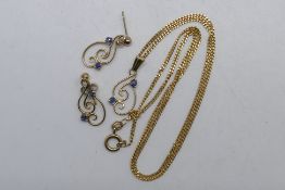A 9ct yellow gold stone set necklace and earrings set (one earring lacking butterfly),