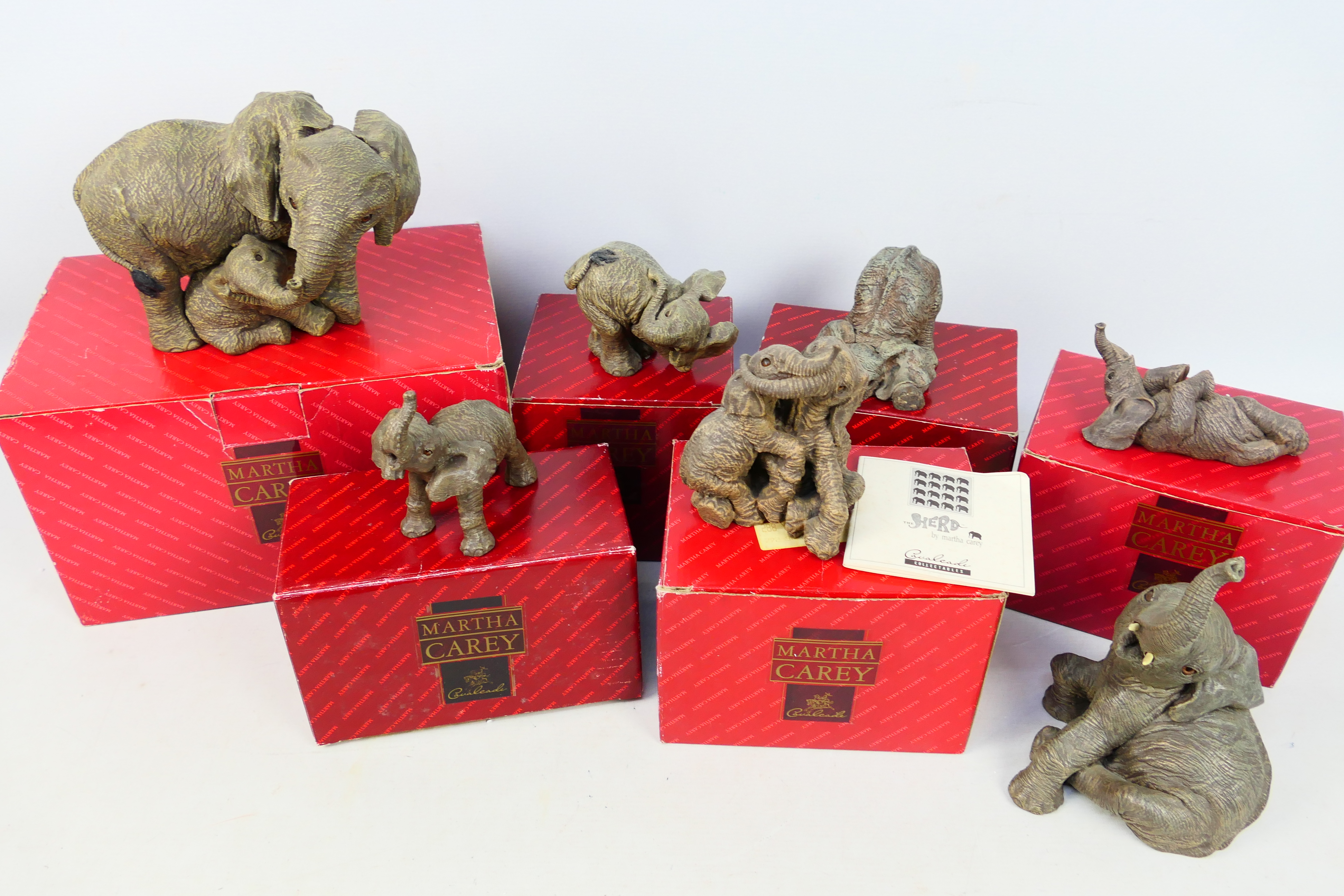 The Herd - 7 x mostly boxed 1991 The Herd' collectable elephants by Martha Carey - Lot includes a